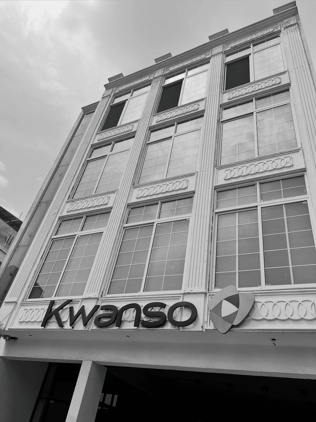 Kwanso office building with Kwanso signage on the facade